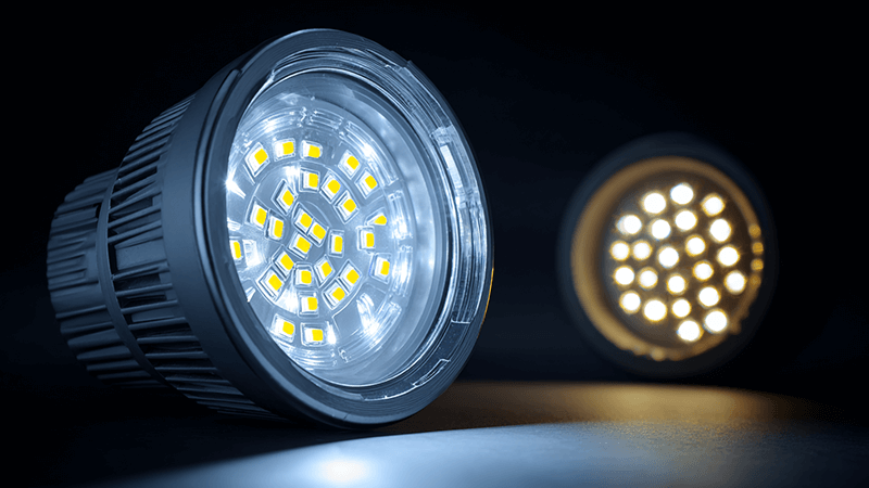 An energy meter showing similar consumption for a COB and SMD downlight