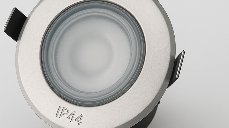 A close-up of an IP44 downlight showing its sealed construction.