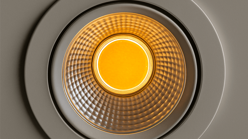 A close-up of a COB LED downlight highlighting its single light source