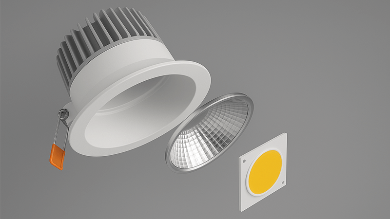 An exploded view of a downlight showing the housing, reflector, and COB LED chip