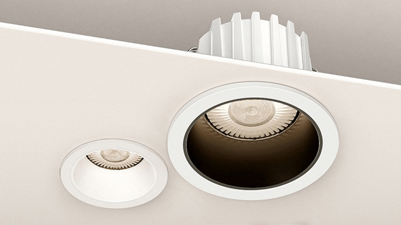 A well-maintained LED downlight shining brightly in a modern ceiling