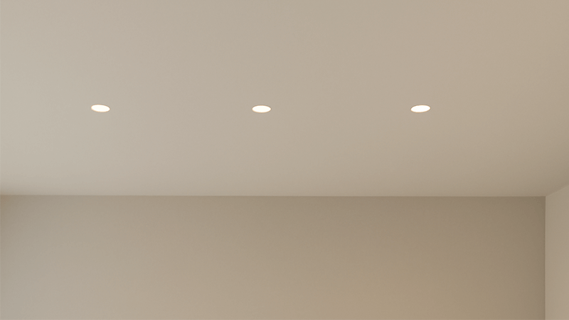 A minimalist ceiling with trimless downlights that are barely visible