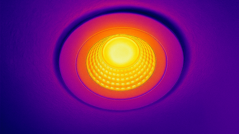 A thermal camera image showing the heat signature of an operating COB downlight.