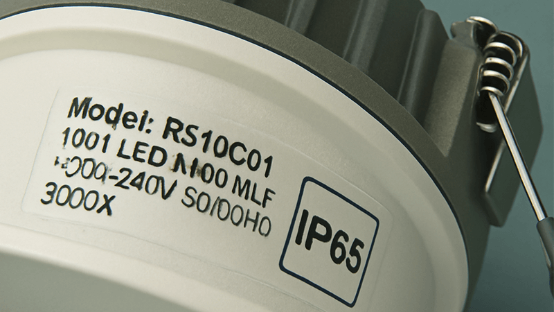 Checking the IP Rating on a Downlight Label A close-up of a product label on an LED downlight showing the IP65 rating mark